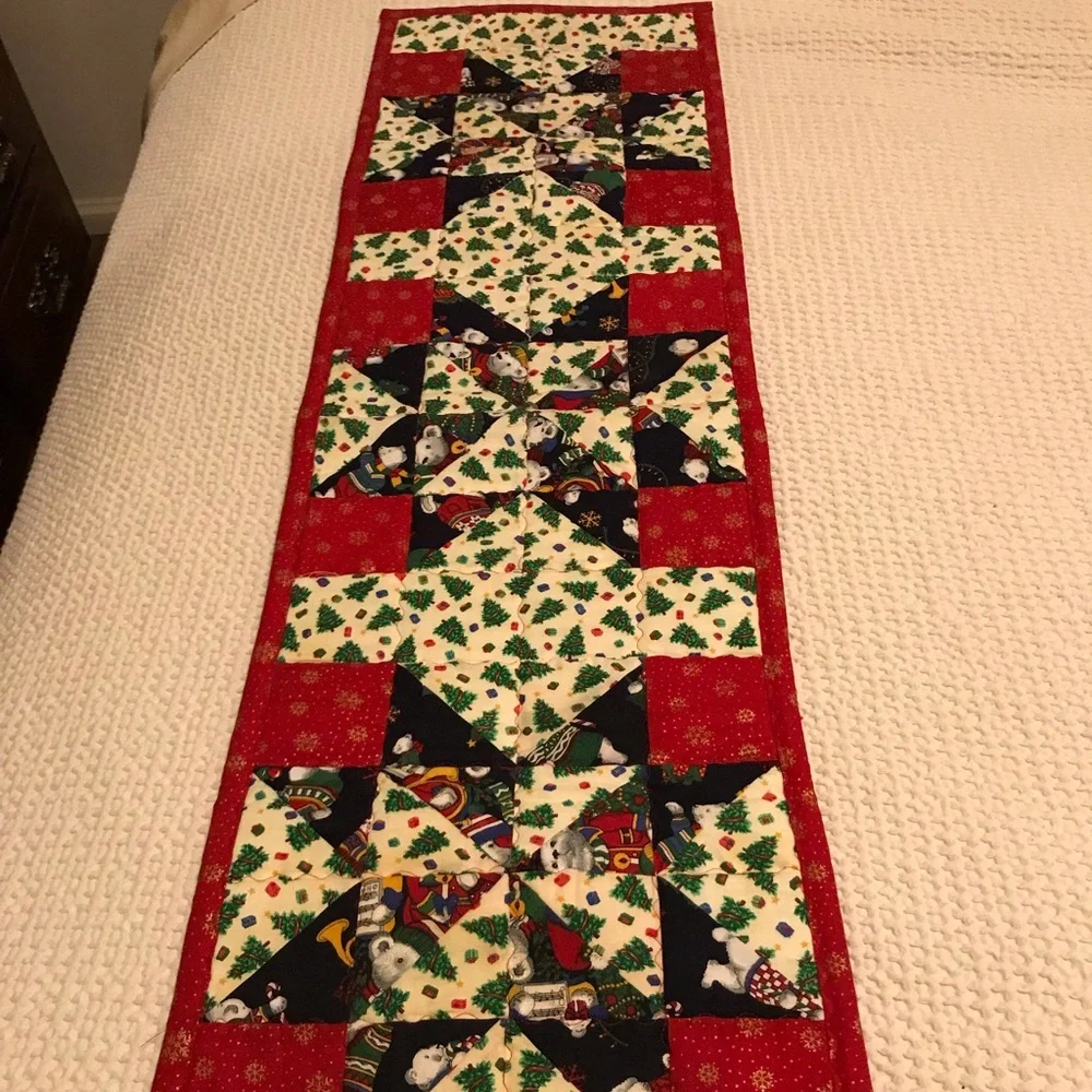 Handcrafted a quilted reversible table runner. Lots of stitching detail